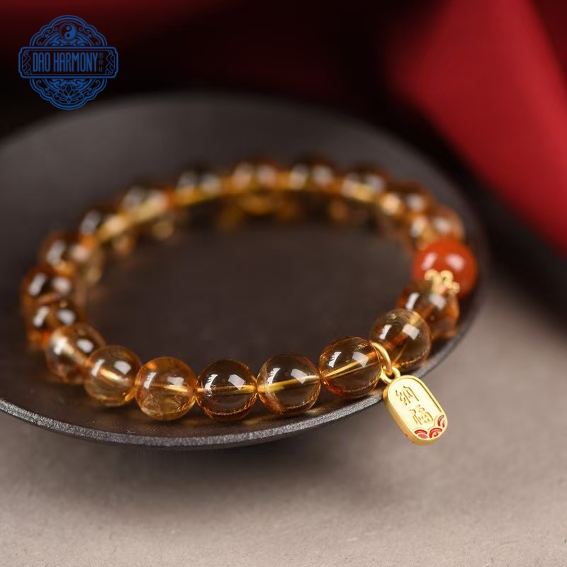 Natural citrine bracelet with red beads belonging to the earth element